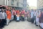 Photos: મતદારોનો અનેરો ઉત્સાહ, ગુજરાતમાં અહીં વડીલો વ્હીલચેરમાં તો ક્યાંક ડ્રેસ કોડમાં મતદાન કરવા પહોંચ્યા
